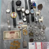 تعدادی سکه وساعت کلکسیونی