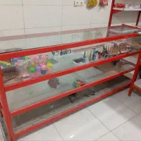 ویترین دو متری--میز چوبی نو -استند جوراب نو