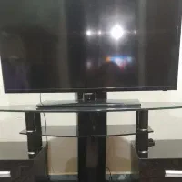 زیر تلویزیون شیشه ای