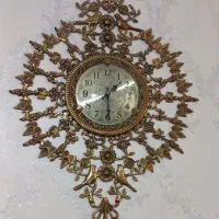 ساعت و میز و آویز برنجی