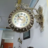 ساعت دیواری دوطرفه