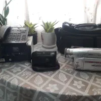 دوعددوسیله فیلم برداری وتلفن