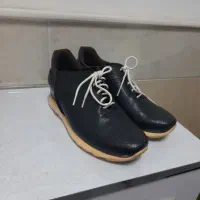 کفش|کیف، کفش، کمربند|قم, قلعه کامکار|دیوار