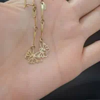 گوشواره و زنجیر طلا۱۰۰بالای تابلو