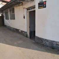 ۹۰ متر زمین   سنددار هفتاد متر بنا  با یک مغازه