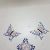 مجسمه پروانه چینی با گل