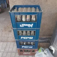 شیشه نوشابه و جعبه