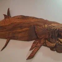 مجسمه های  دیوار کوب  و رومیزی چوبی