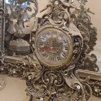 ساعت . شمعدان . آینه