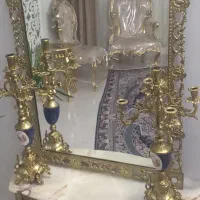 خریدار. آینه شمعدون ولوستر برنجی و..