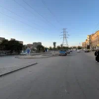 زمین دور دیوار توس33 شقایق 2 خیابان 60 متری