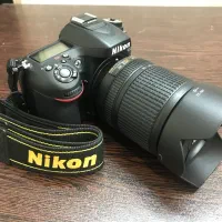دوربین نیکون D7100با لنز 18-140