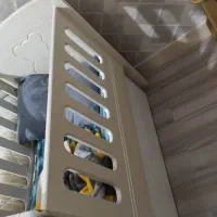 تخت خواب نوزاد کنار تخت مادر