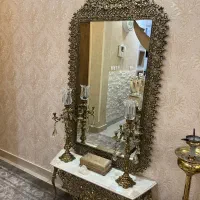 اینه و شمعدان برنجی