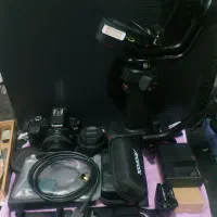 گیمبال Zhiyun و دوربین Canon R100 با دو لنز