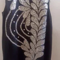 لباس مجلسی|لباس|ملکشاهی, |دیوار