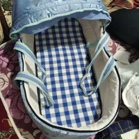 ساک حمل کودک و لباس عربی بچگانه