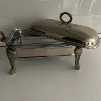 سوفله خوری با ظرف شیشه ای داخلش