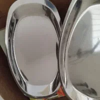 تعدادی ظرف وظروف اشپزخانه