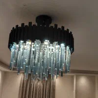 لوستر کریستالی شیک و مدرن مشکی مات با کریستال دودی
