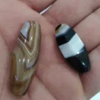 مهره جذب انرژی مثبت برای انواع. مشکلات
