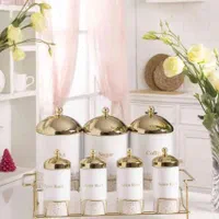 پاسماوری اورانوس جا حبوبات درب دار فلزی چینی طلایی|ظروف نگهدارنده، پلاستیکی، یک‌بارمصرف|یزد, |دیوار