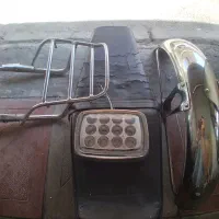 قطعات موتوسیکلت ترک بند.صندلی.گلگیر.چراغ یخی