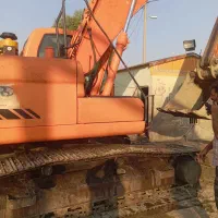بیل میکانیکی دوسان Dx