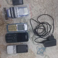 موبایل به همراه یک عدد شارژر