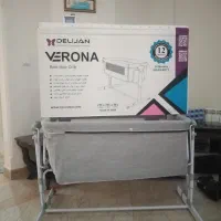 تخت کنار مادر نوزاد دلیجان
