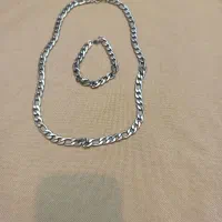 دست بند وگردن بند استیل