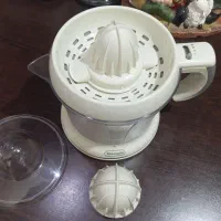 آب میوه آب پرتقال آب مرکبات گیری برقی دلونگی