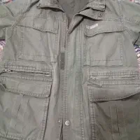 کابشن امریکایی|لباس|قم, قلعه کامکار|دیوار