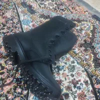 پوتین|کیف، کفش، کمربند|سیلوانه, |دیوار