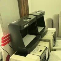 دستگاه تشخیص اسکناس تقلبی