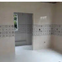 کاشی کاری ، تخریب و بازسازی ساختمان