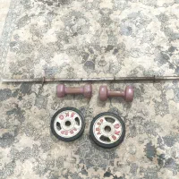 دمبل دو تا 5 کیلوی و دوتا صفحه ی 5 کیلوی وبا هالتر