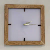 ساعت دیواری فریم چوبی