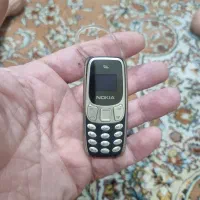 یک گوشی نوکیا خیلی کوچک دو سیم کارت