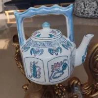 قوری و جا ادویه و ست فنجان و نلبکی