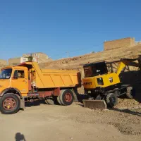 اجاره مینی بیل چرخ لاستیکی