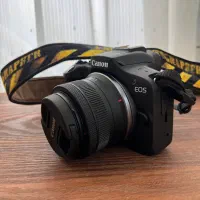 دوربین canon R100 نو به قیمت دسته دو