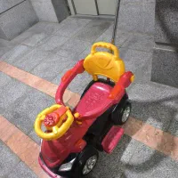 ماشین حمل کودک دسته دار موزیکال