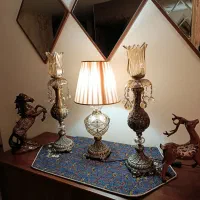 دو عدد شمعدان طرح برنز با اباژور