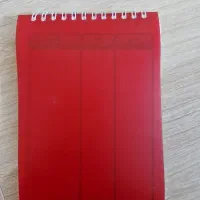 دو دفترچه یادداشت فنردار صورتی و زرد ۱۰ در ۱۵