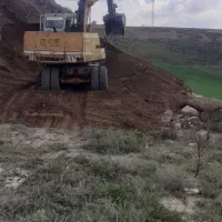 بیل مکانیکی لاستیکی