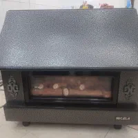 بخاری شومینه ی نیک کالا در حد نو