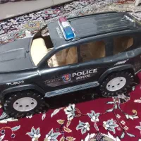 ماشین بزرگ و عروسک سگ