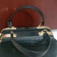 یک عدد کیف مجلسی