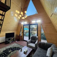 کلبه چوبی با استخر اب گرم|اجارهٔ کوتاه‌مدت ویلا و باغ|گلوگاه بابل (گلیا), |دیوار